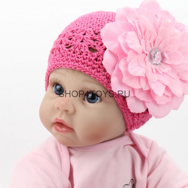 Кукла реборн Эмма 55 см в шапочке