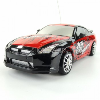 Радиоуправляемая машинка для дрифта Nissan Skyline GT-R 1:24 - 666-210 ПОЛНЫЙ ПРИВОД! Сменные колеса! Светящиеся фары при движении вперед, задние светящиеся стоп-сигналы!