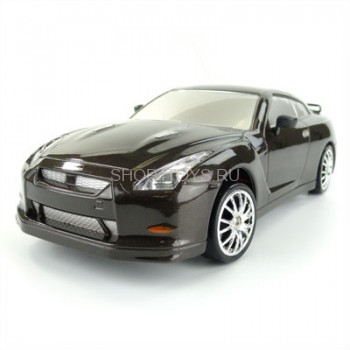 Радиоуправляемая машинка для дрифта Nissan Skyline GT-R 1:24 - 666-220 ПОЛНЫЙ ПРИВОД! Сменные колеса! Светящиеся фары при движении вперед, задние светящиеся стоп-сигналы!