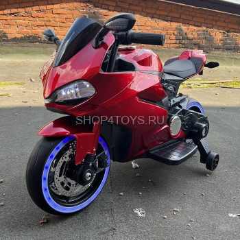 Детский электромотоцикл Ducati Red (12V, EVA, ручка газа) - FT-1628-SP-RED Детский электромотоцикл Ducati Red (12V, EVA, ручка газа) - FT-1628-SP-RED - это яркий спортивный электробайк с диодной подсветкой колес, фар, задних стопов и габаритных огней, а также поворотной ручкой газа, благодаря которой вы можете еще более точно дозировать мощность