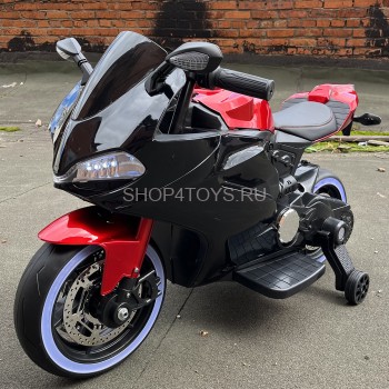 Детский электромотоцикл Ducati Red Black (12V, EVA, ручка газа) - FT-1628-SP-RED-BLACK Детский электромотоцикл Ducati Red Black (12V, EVA, ручка газа) - FT-1628-SP-RED-BLACK - это яркий спортивный электробайк с диодной подсветкой колес, фар, задних стопов и габаритных огней, а также поворотной ручкой газа, благодаря которой вы можете еще более точно дозировать мощность